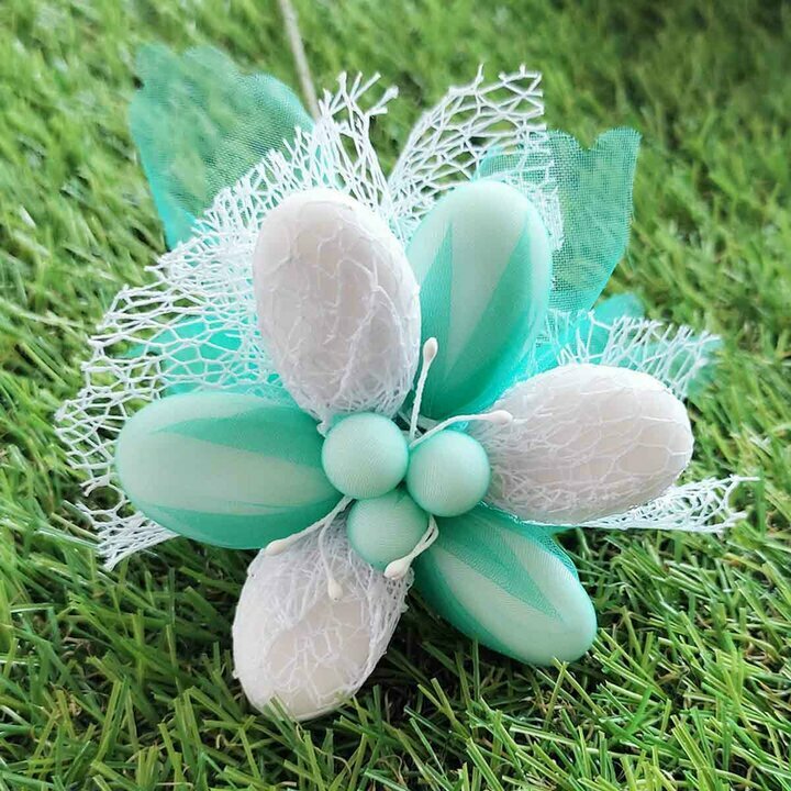 Fleurs de drages marguerite tulle vert d'eau